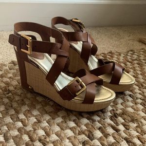 Leather cross strapped wedges.